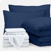 A bed in a bag folded and stacked neatly