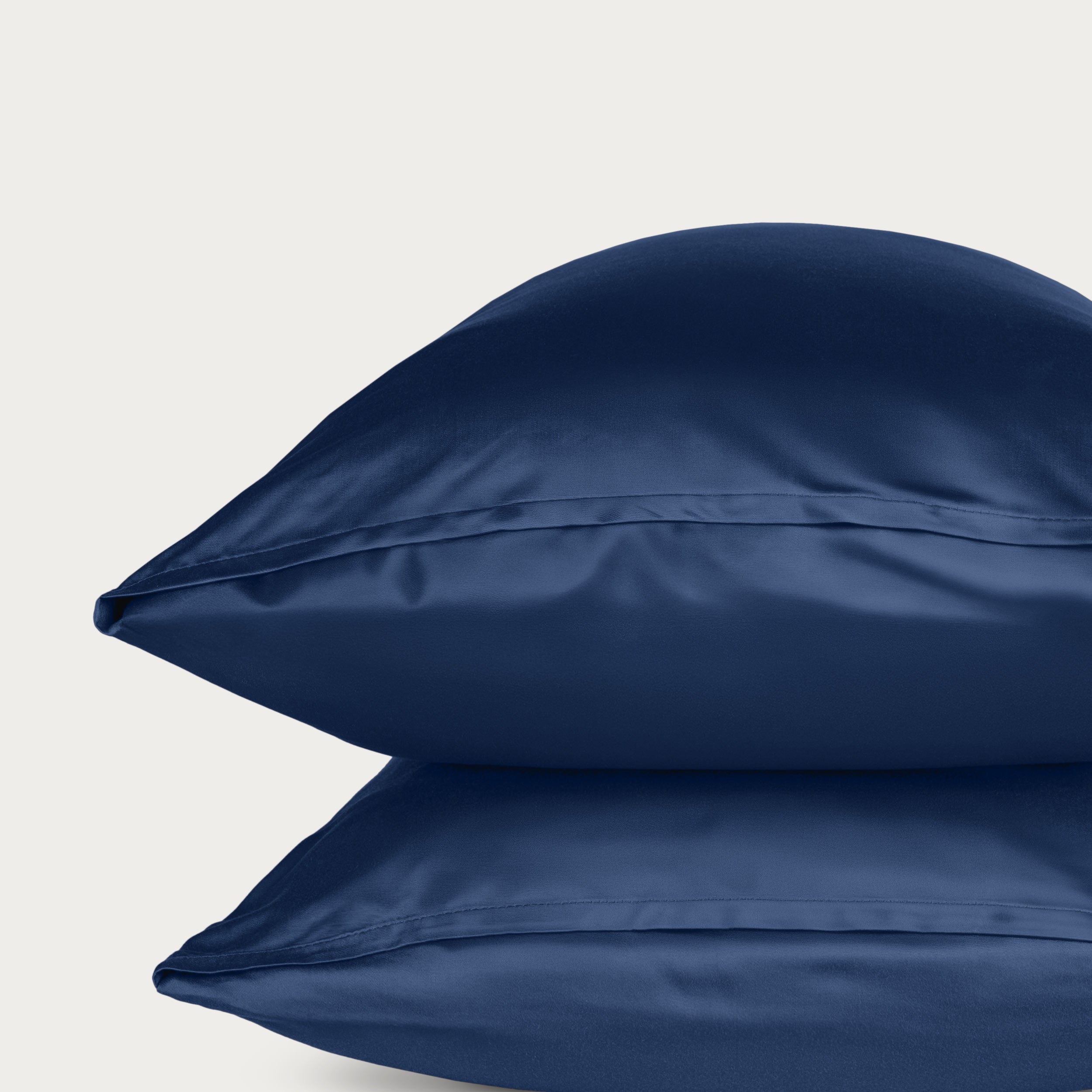 Two bamboo pillowcases on a light gray background