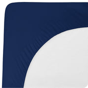 The back of a mattress with a mattress pad on it