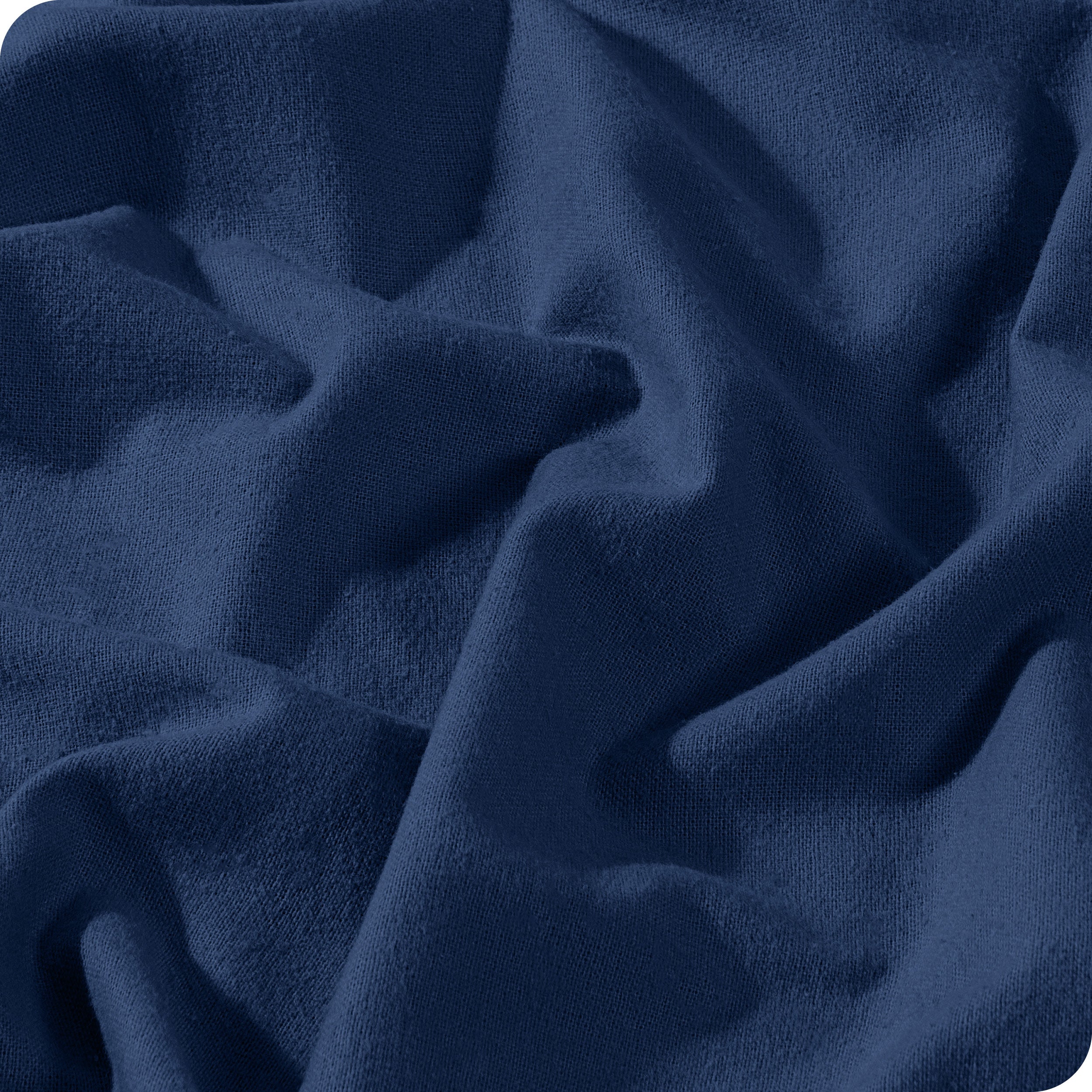 A close view of a button and lining on the flannel duvet cover.
