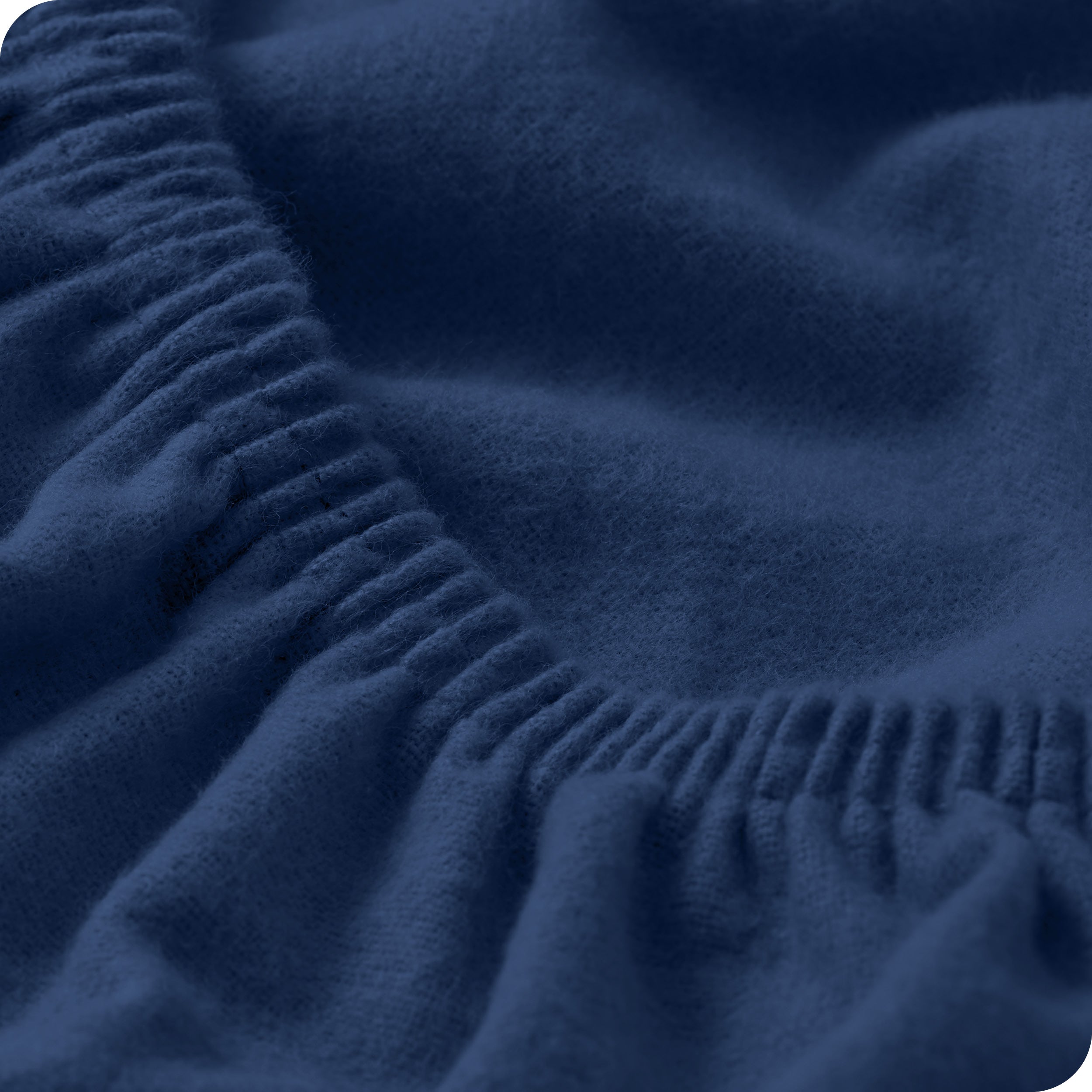 Close up of the elastic part of a fitted sheet