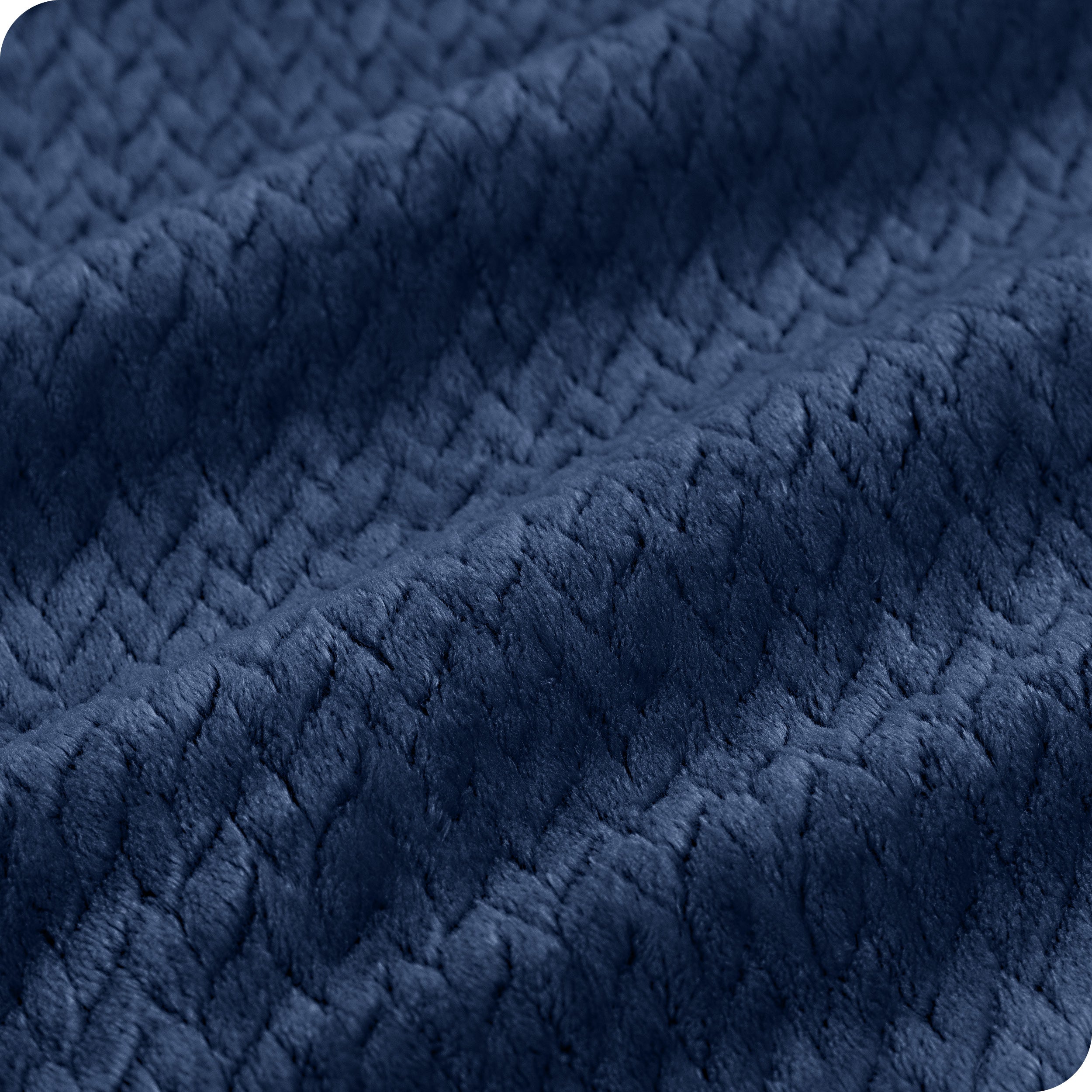 Close up of a chevron microplush blanket showing the texture