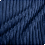 Close up of a ribbed microplush blanket showing the texture