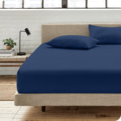 An organic cotton fitted sheet on a mattress