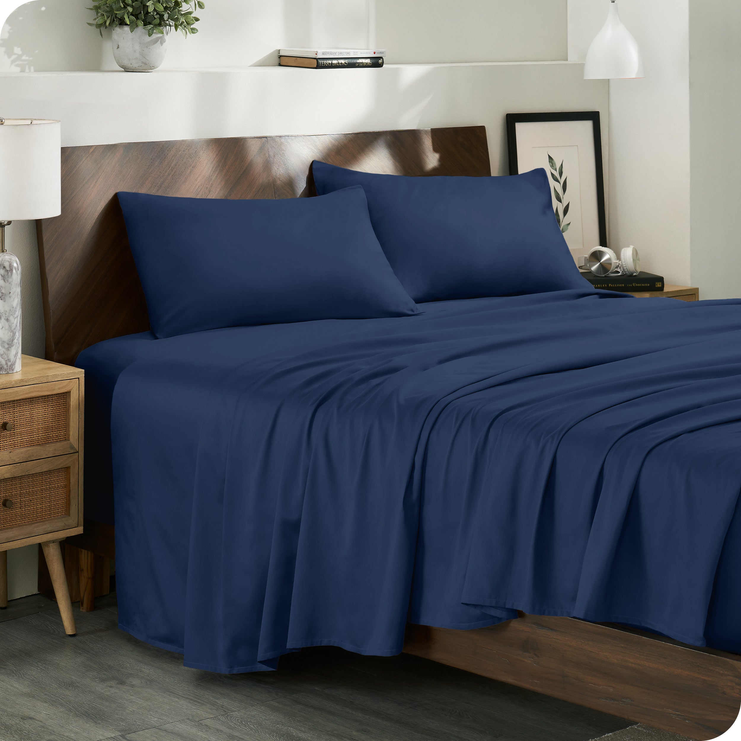 Diagonal view of a decorated room scene with sateen sheets