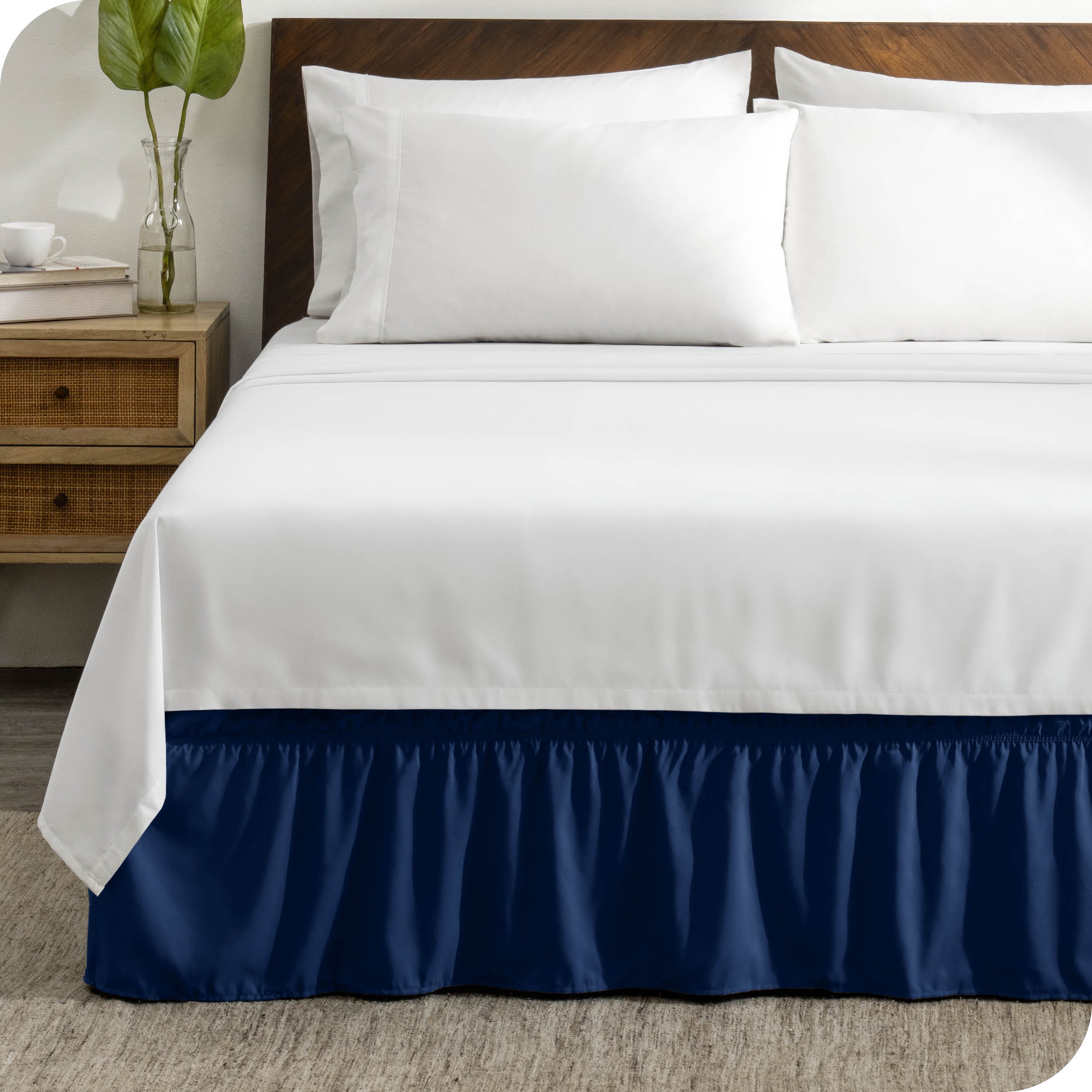 A wrap around bed skirt on a bed