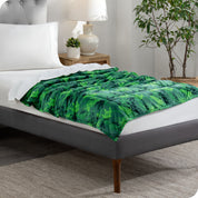 A weighted blanket laid out on a bed