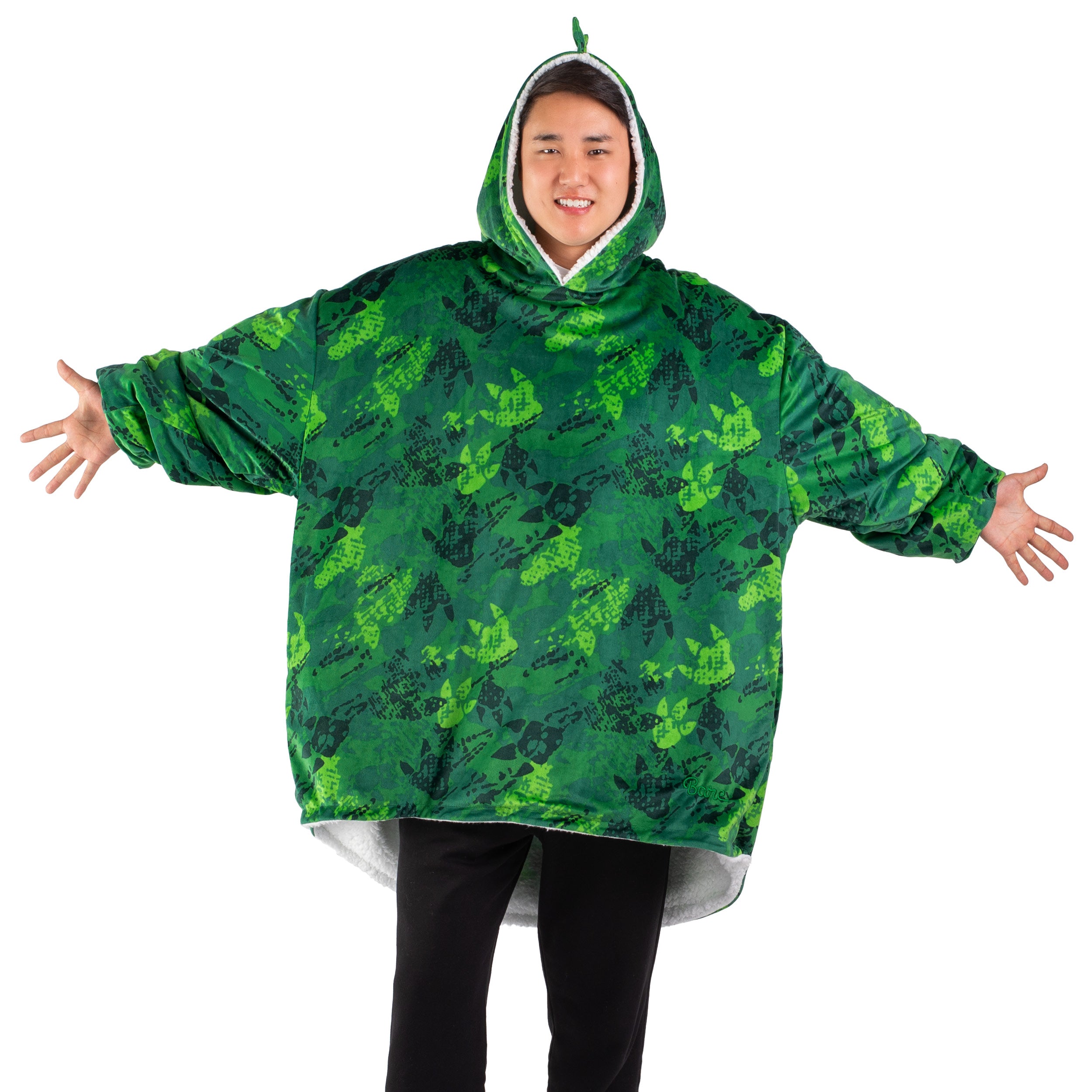 An adult with a sherpa wearable blanket on