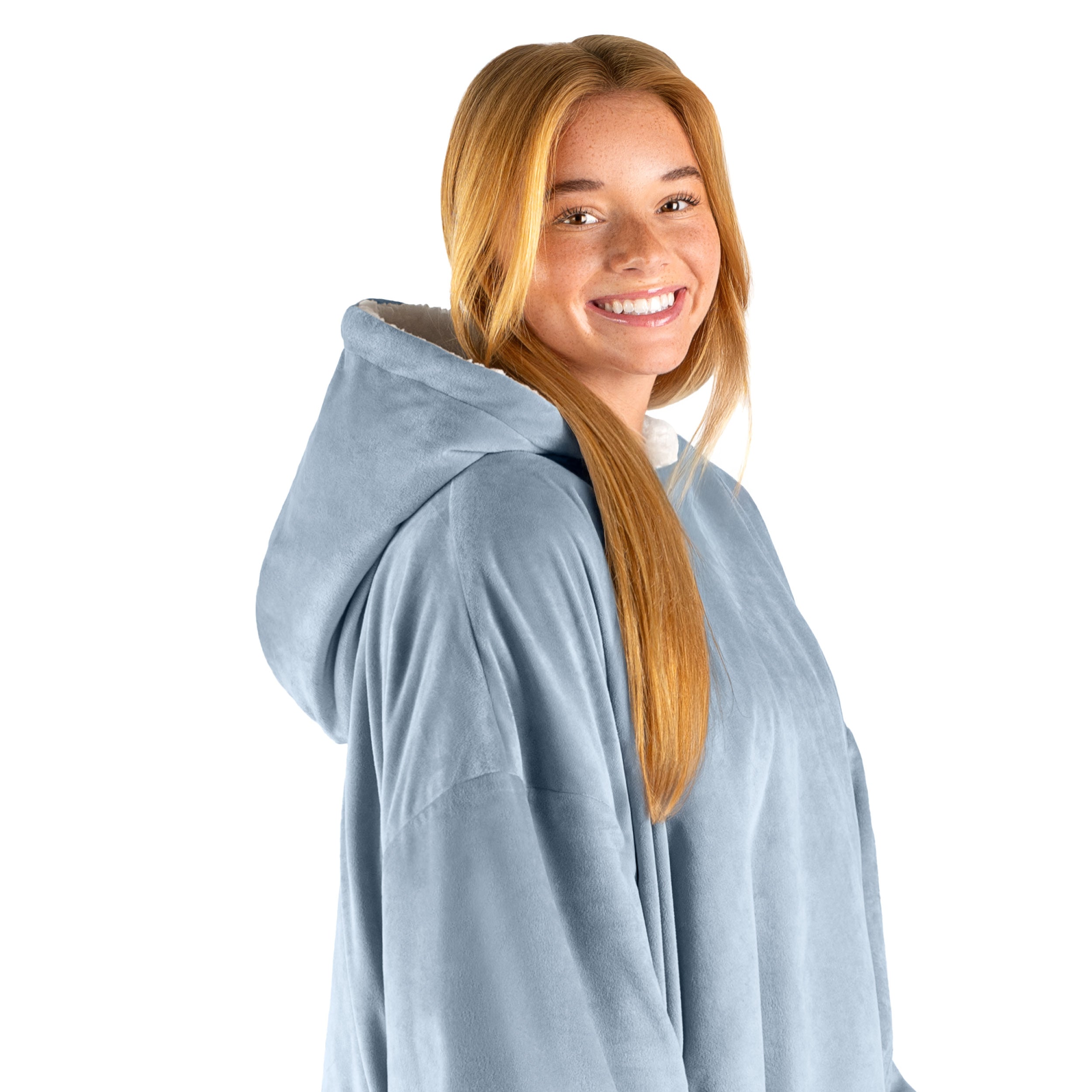 An adult with a hooded wearable blanket on