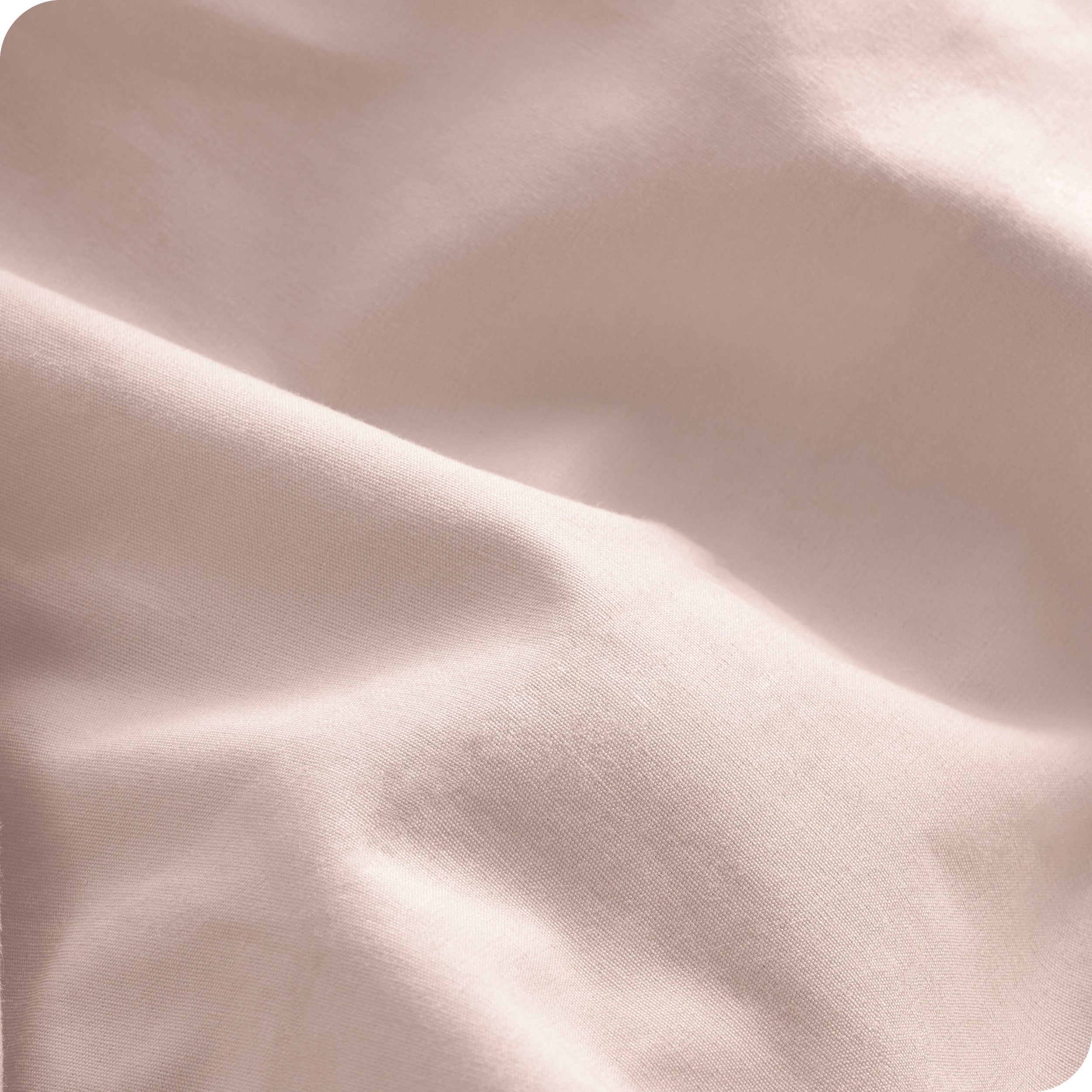 A close view of the organic cotton percale duvet cover showing the texture, color, and fabric.