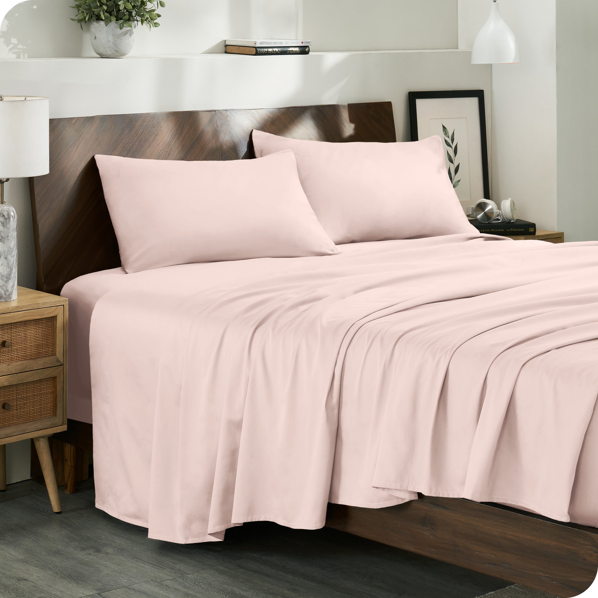 Diagonal view of a decorated room scene with sateen sheets