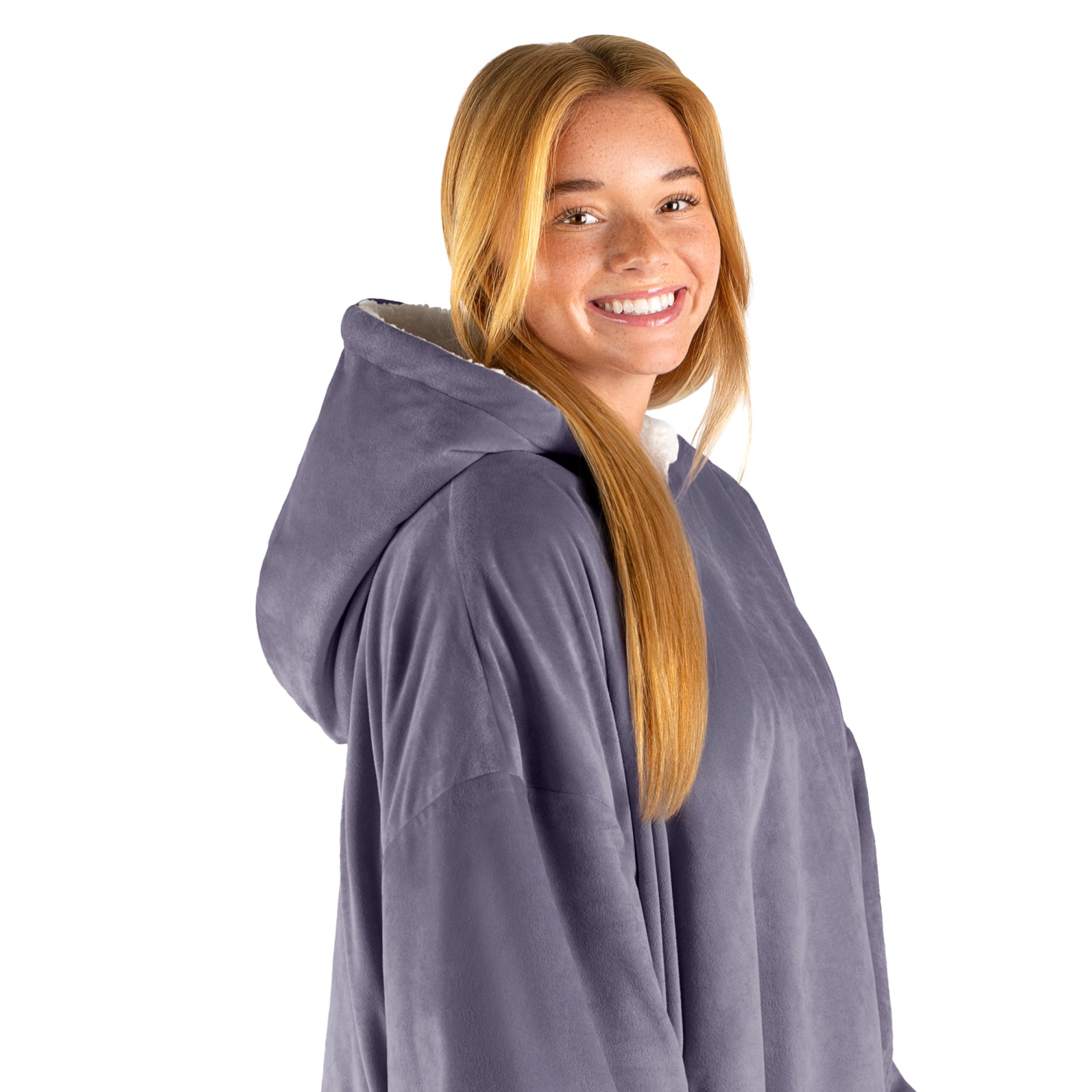 An adult with a hooded wearable blanket on
