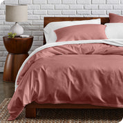 A modern bed with a organic cotton percale duvet cover on.