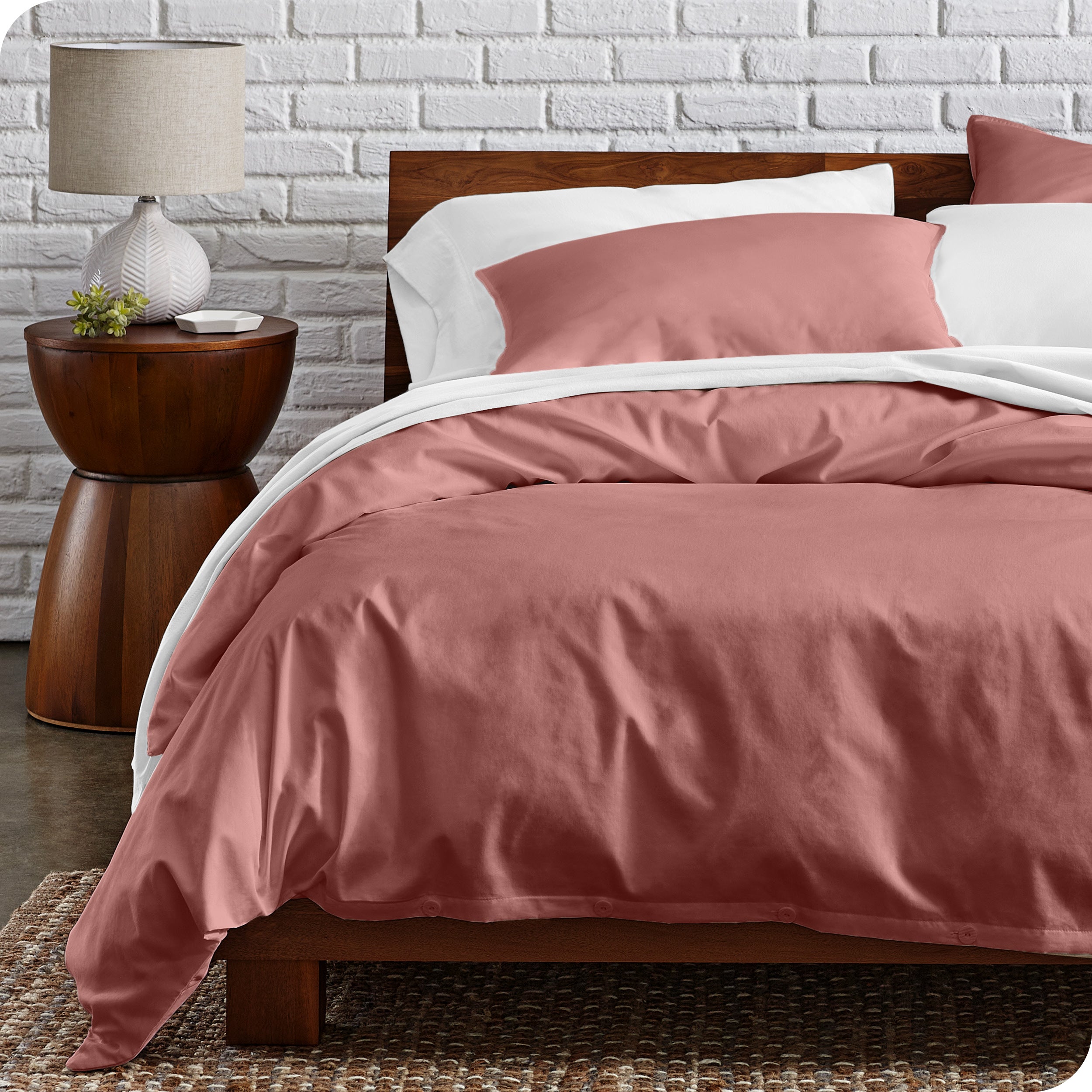 A modern bed with a organic cotton percale duvet cover on.