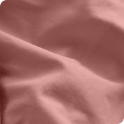 A close view of the oraganic cotton percale duvet cover showing the texture, color, and fabric.