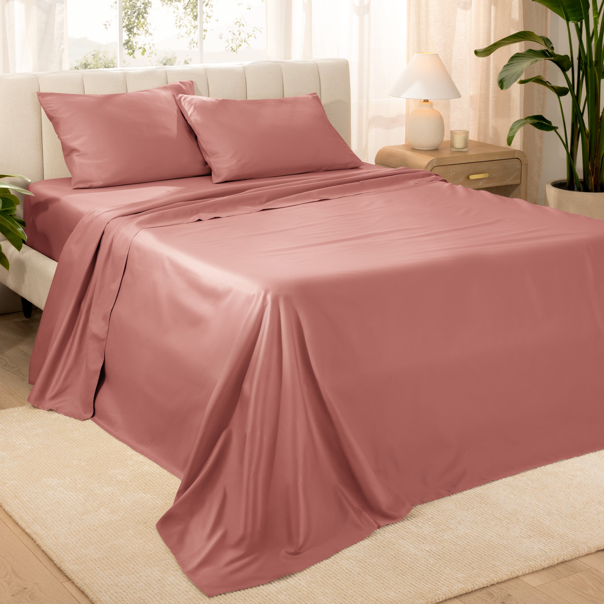 Diagonal view of a decorated room scene with sateen sheets