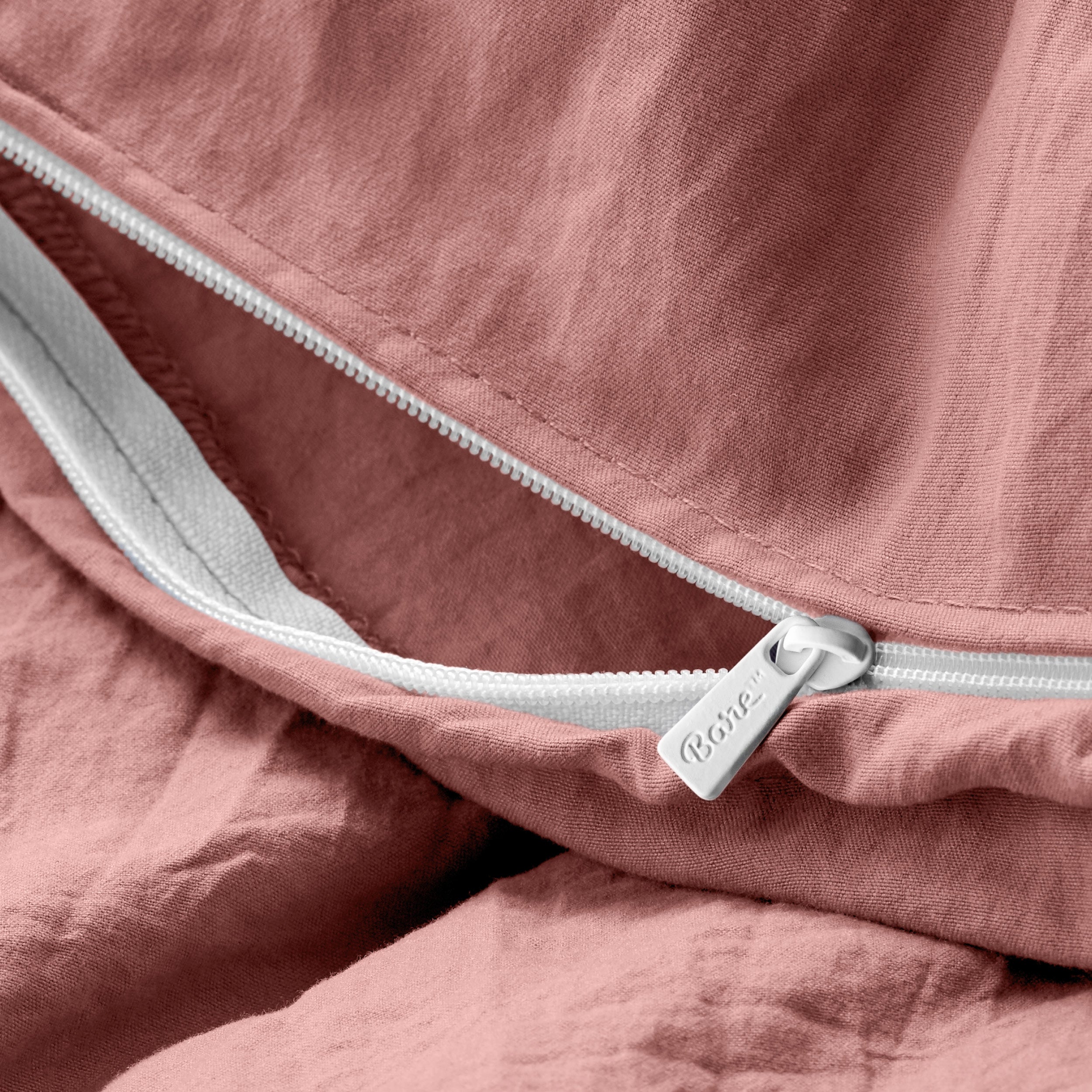 Close up of the zipper on the duvet cover partially opened