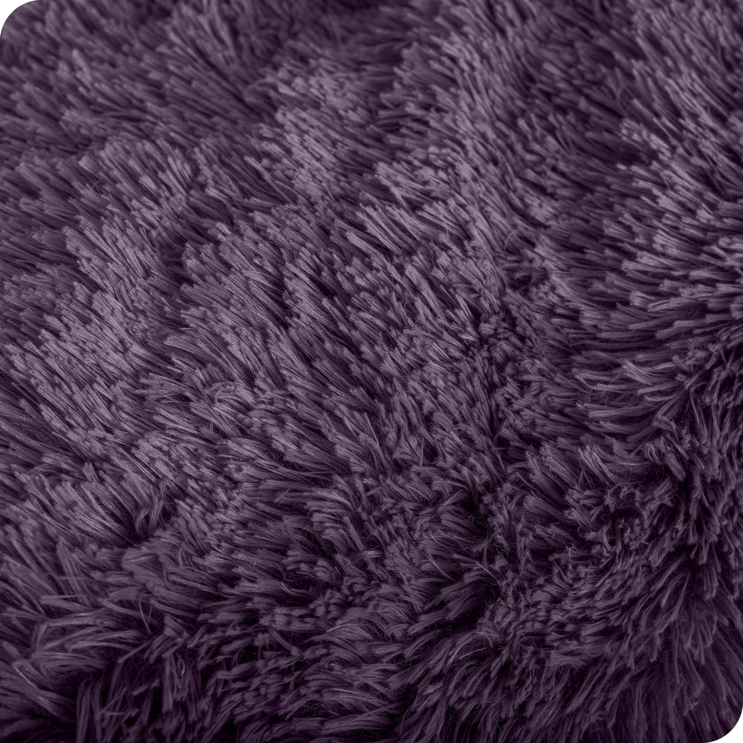 Close up of the soft texture of a shaggy faux fur sherpa blanket