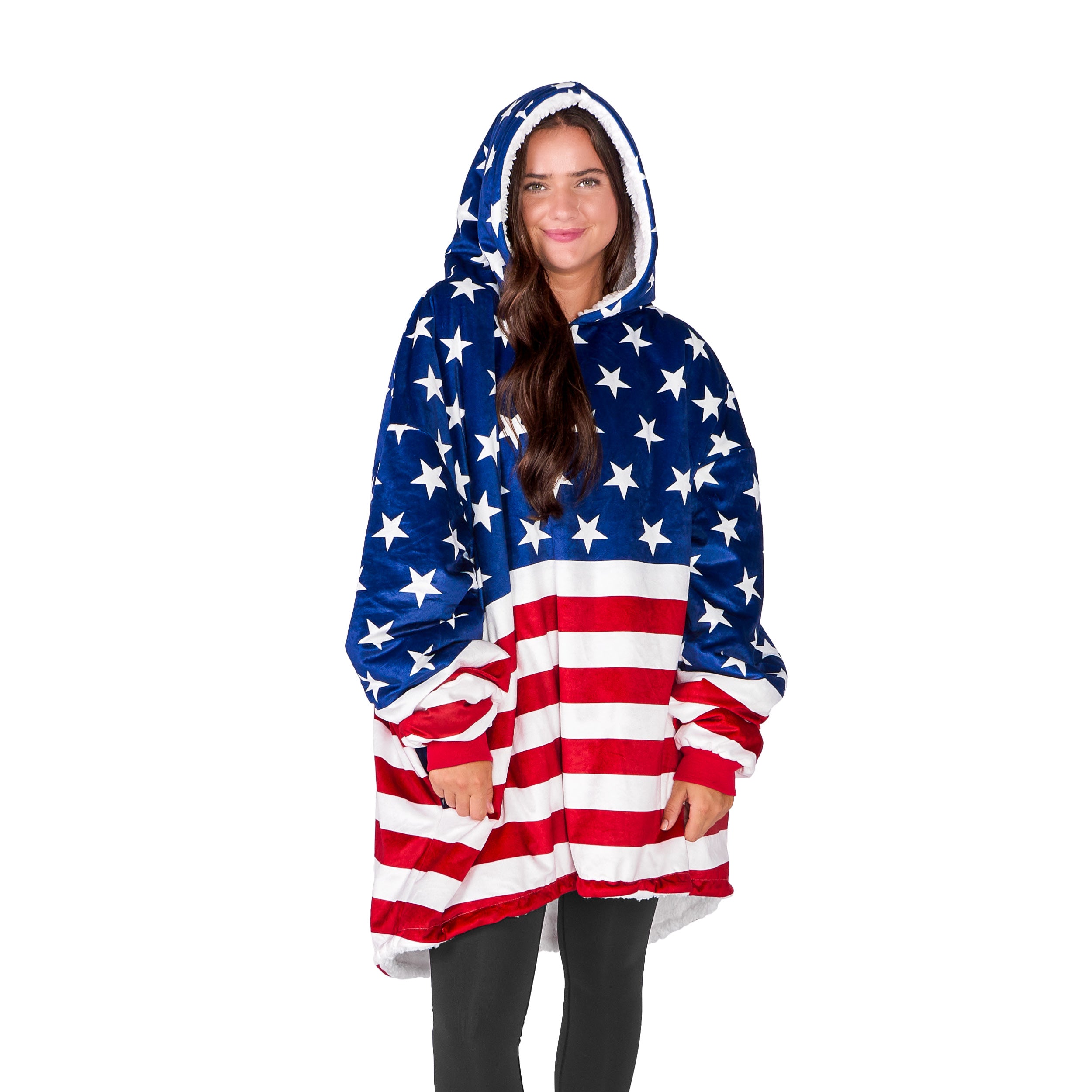 An adult with a sherpa wearable blanket on