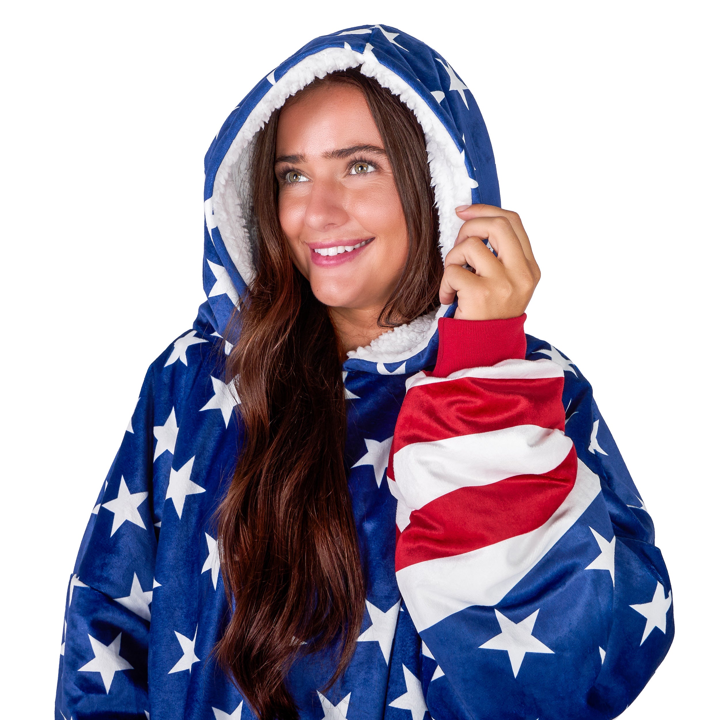 An adult with a sherpa wearable blanket on