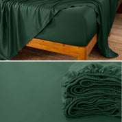 Bamboo fitted sheet on a wooden bed with a close-up of the folded sheet below.