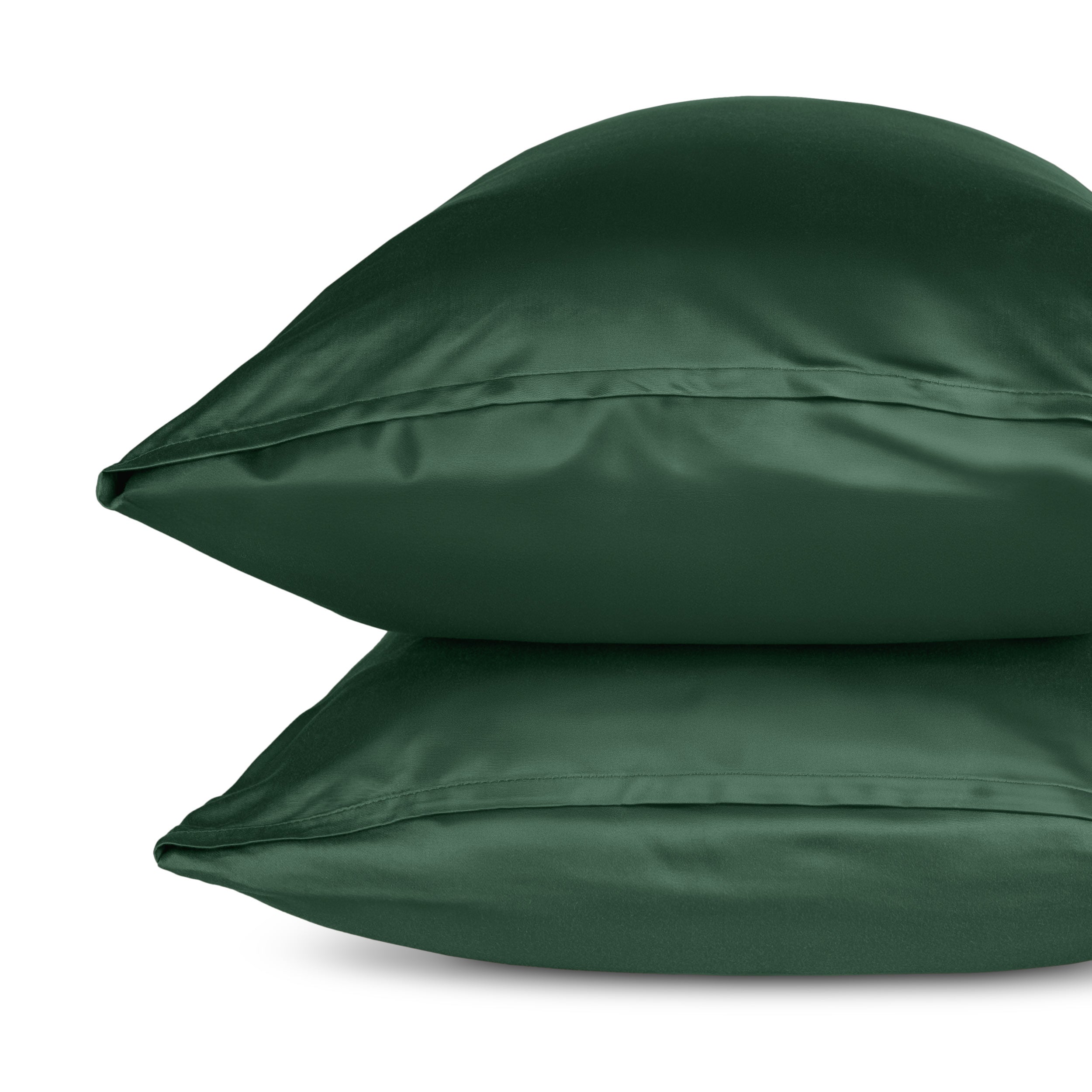 Two pillows with pillowcases stacked on a white background