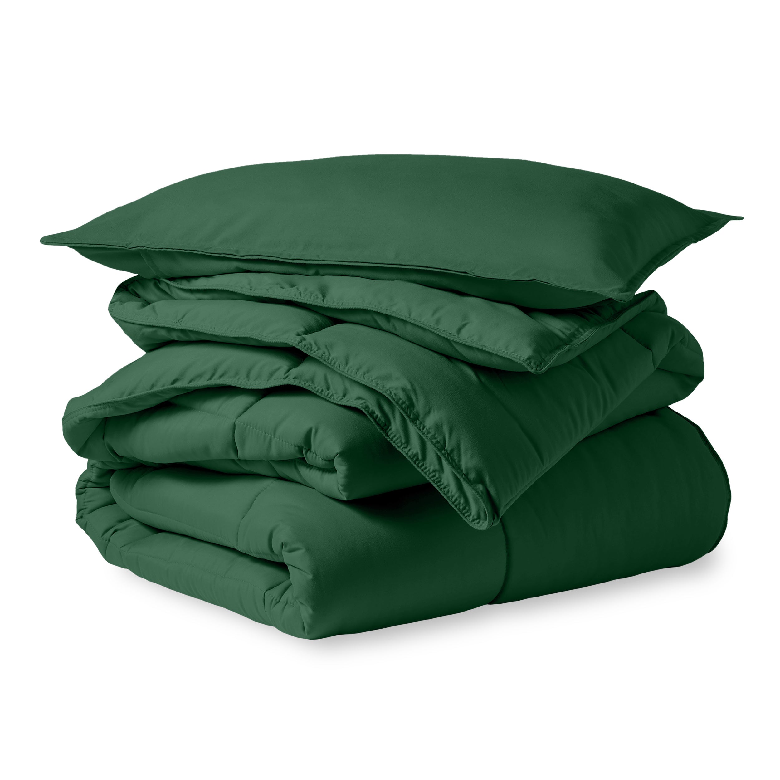 A microfiber comforter folded neatly with a pillow from above