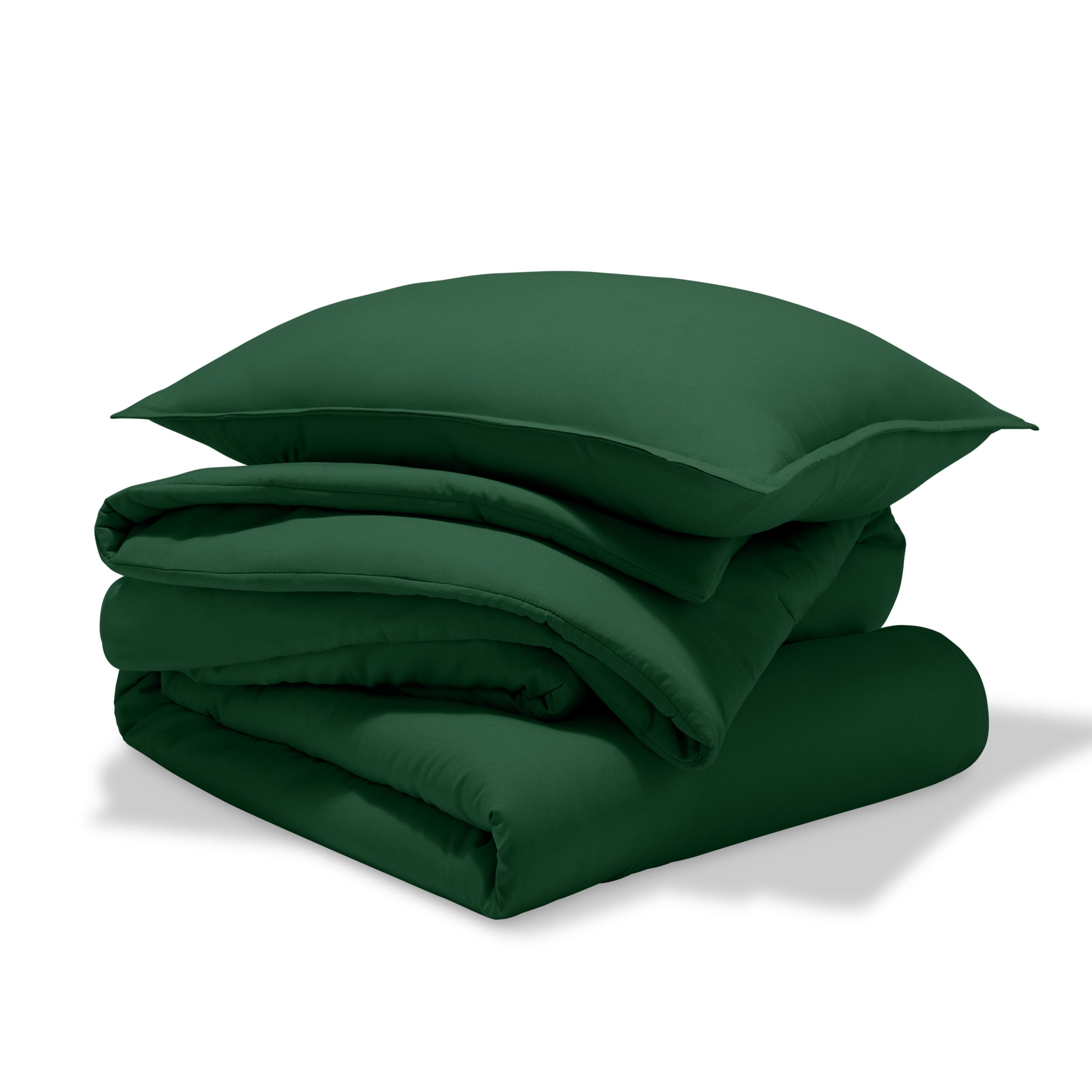 A comforter folded with a matching pillow sham stacked on top