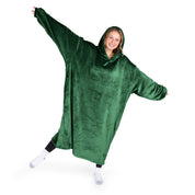 A woman has a hooded wearable blanket on
