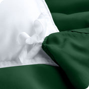 The corner ties of a duvet cover attached to a duvet insert
