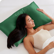 A woman sleeping on a silk pillowcase