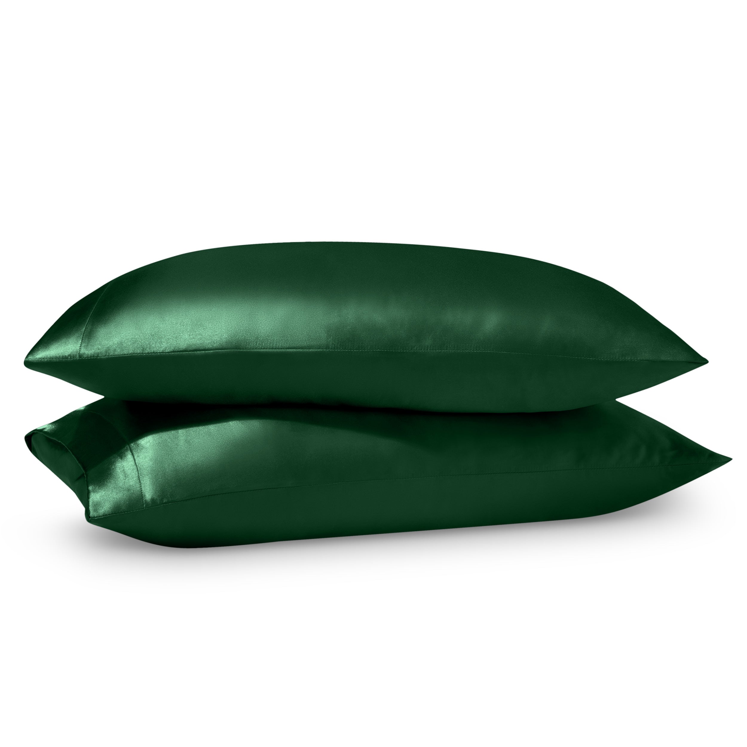 Two pillows on a white background with satin pillowcases on them.