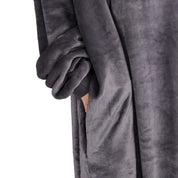 Close up of a side pocket on a microplush wearable blanket