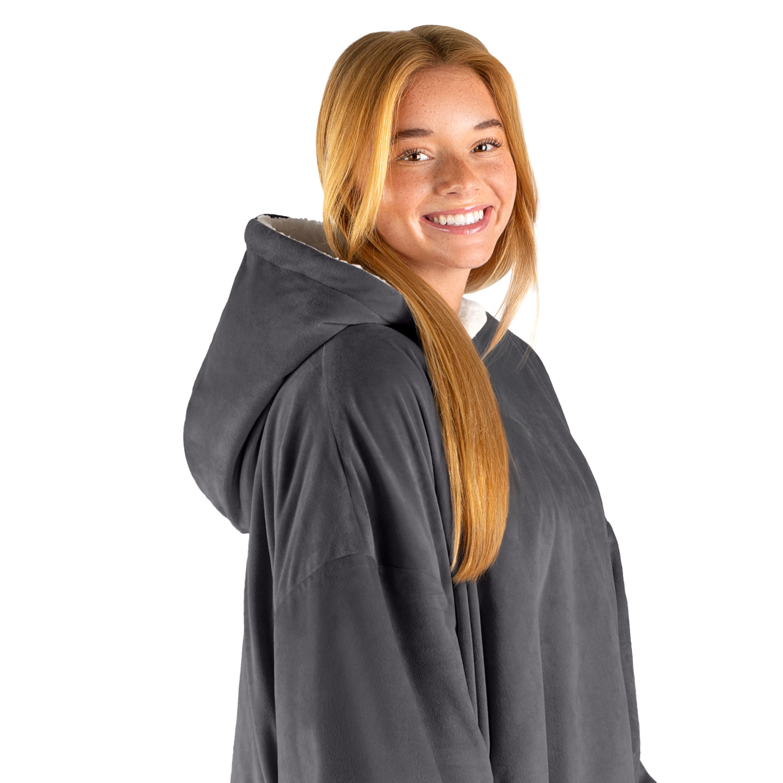 An adult with a hooded wearable blanket on