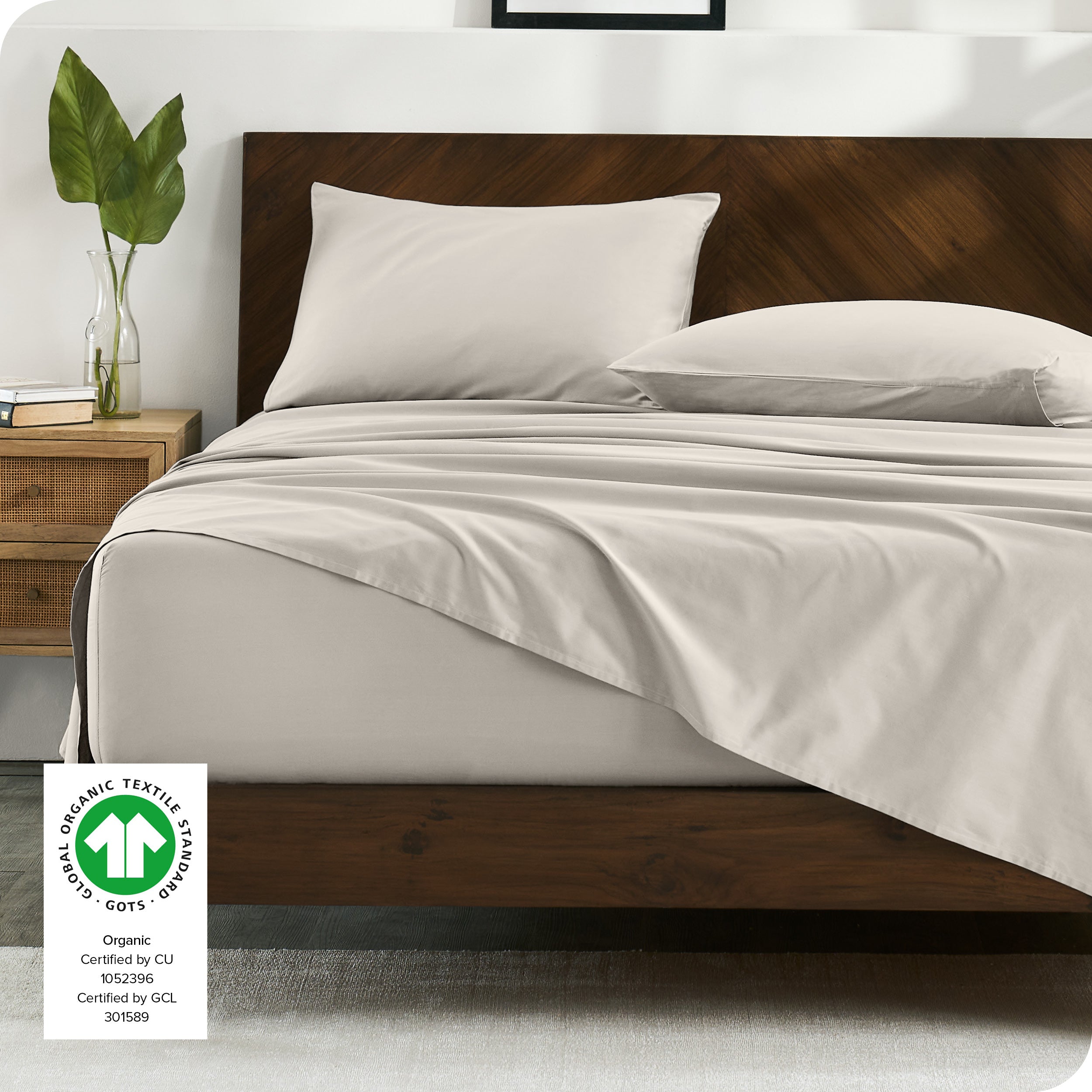 Modern bedroom with organic cotton sateen sheets on the bed