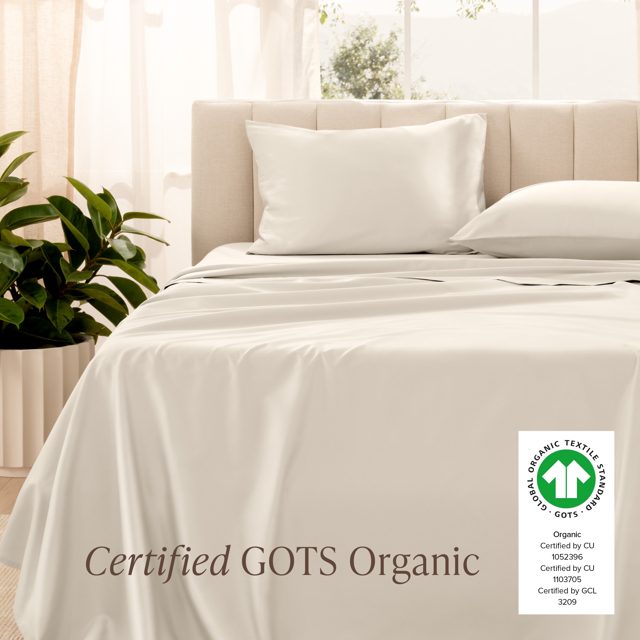 A woman sleeping on a bed made with organic cotton sateen sheets and pillowcases
