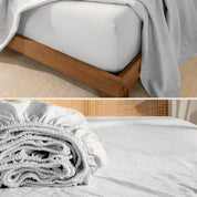 Close up of linen sheet set on a mattress and folded