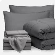 A bed in a bag folded and stacked neatly