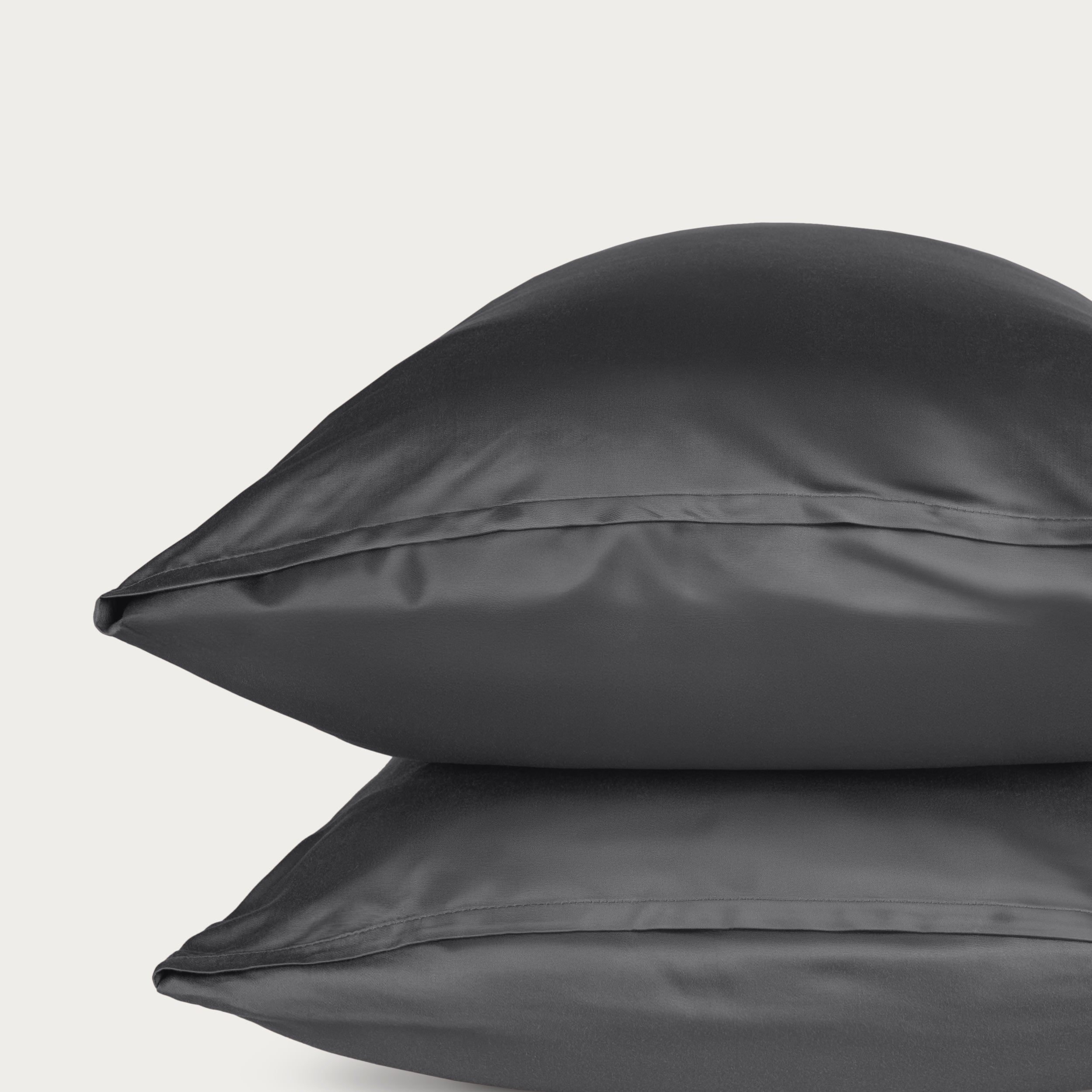 Two bamboo pillowcases on a light gray background