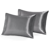 Two silk pillowcases on pillows