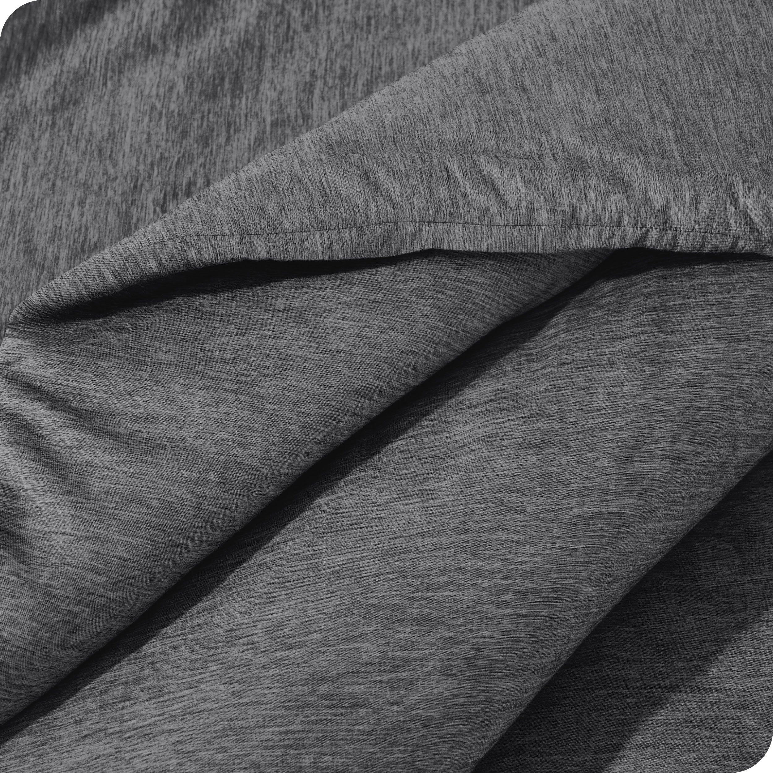 A close up of a corner of the microfiber comforter
