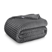 A folded microplush blanket