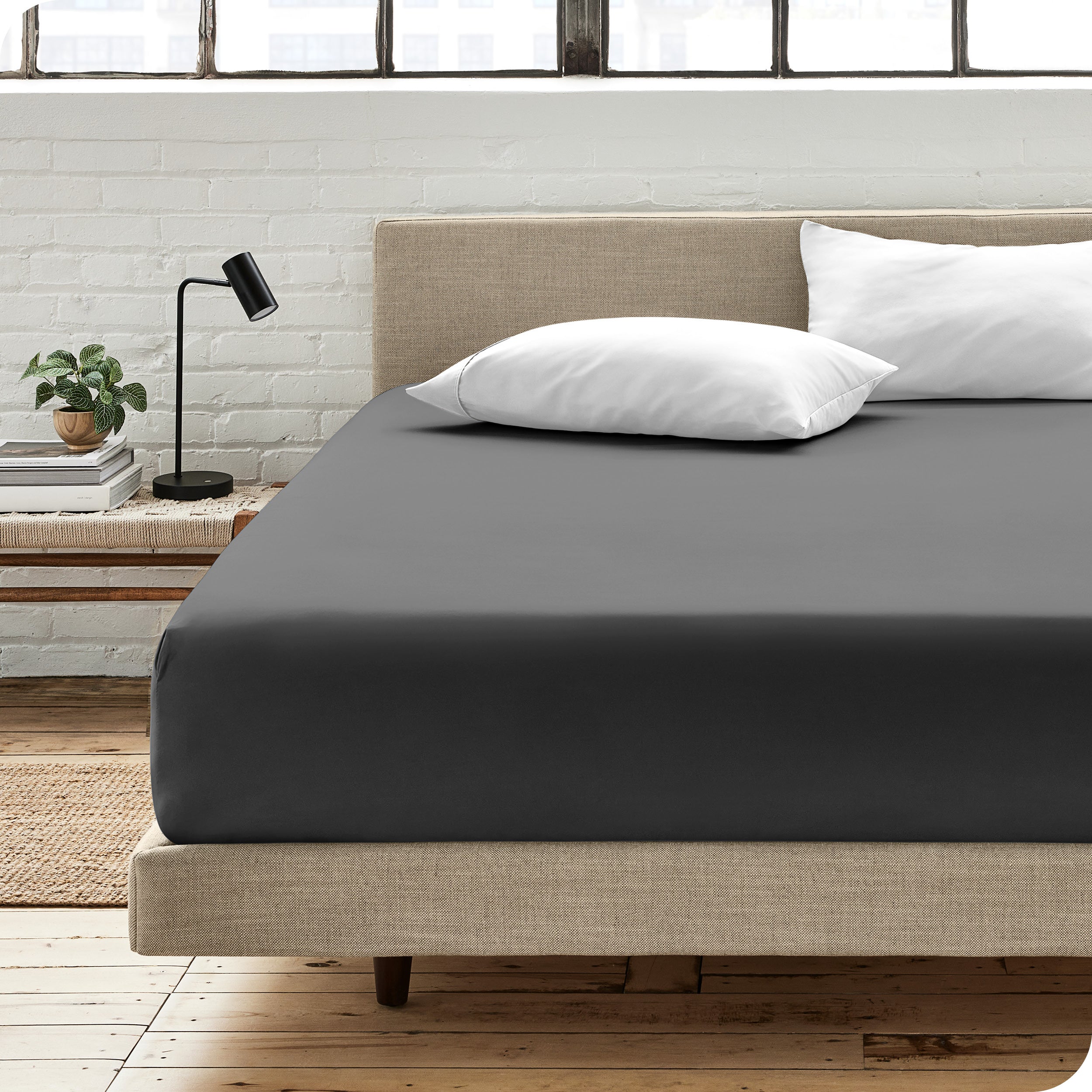 An organic cotton fitted sheet on a mattress