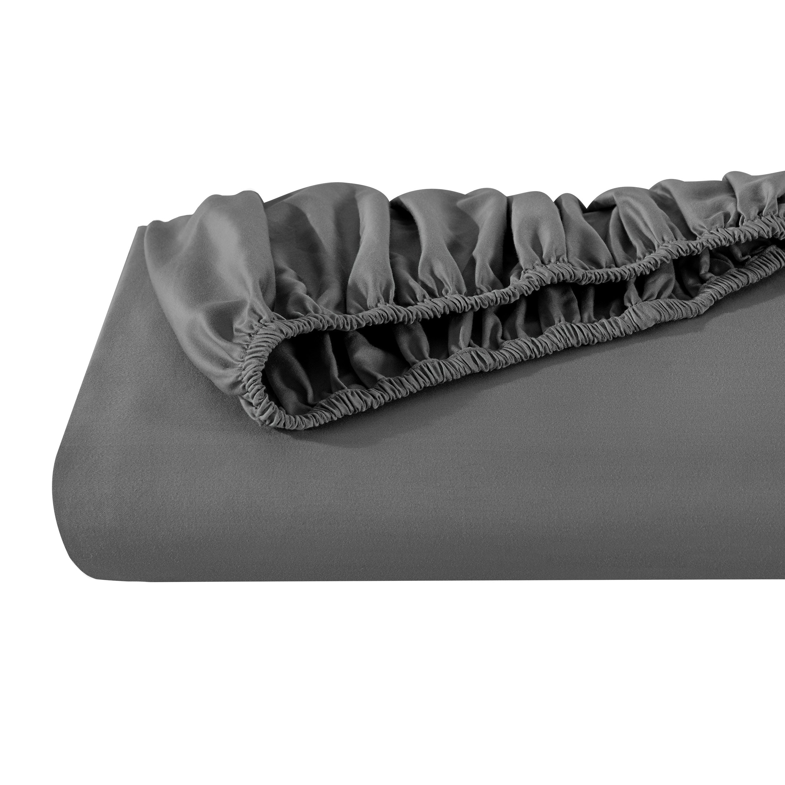 A single fitted sheet folded neatly showing part of the elastic