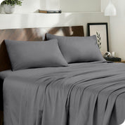 Modern bedroom with organic cotton sateen sheets on the bed