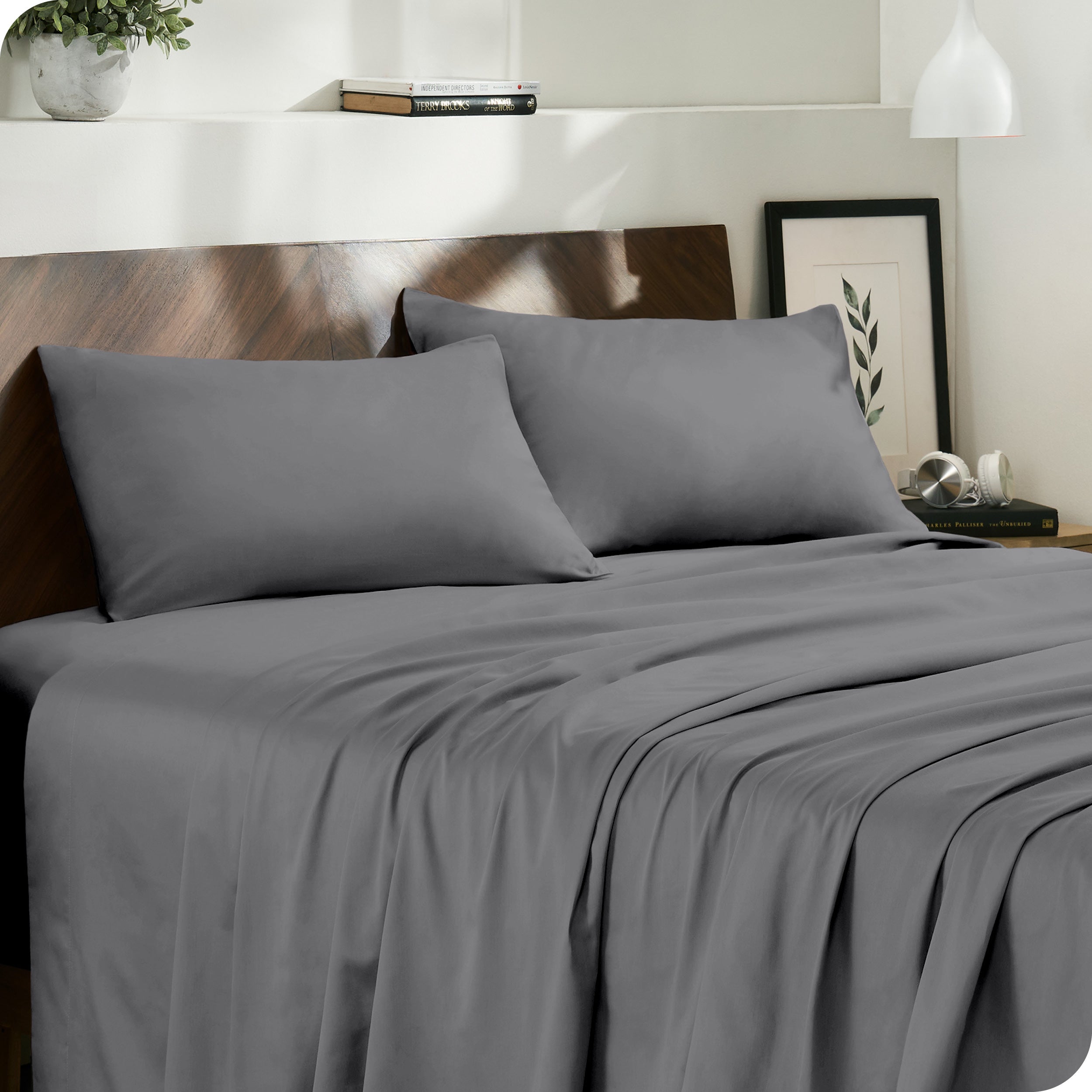 Modern bedroom with organic cotton sateen sheets on the bed