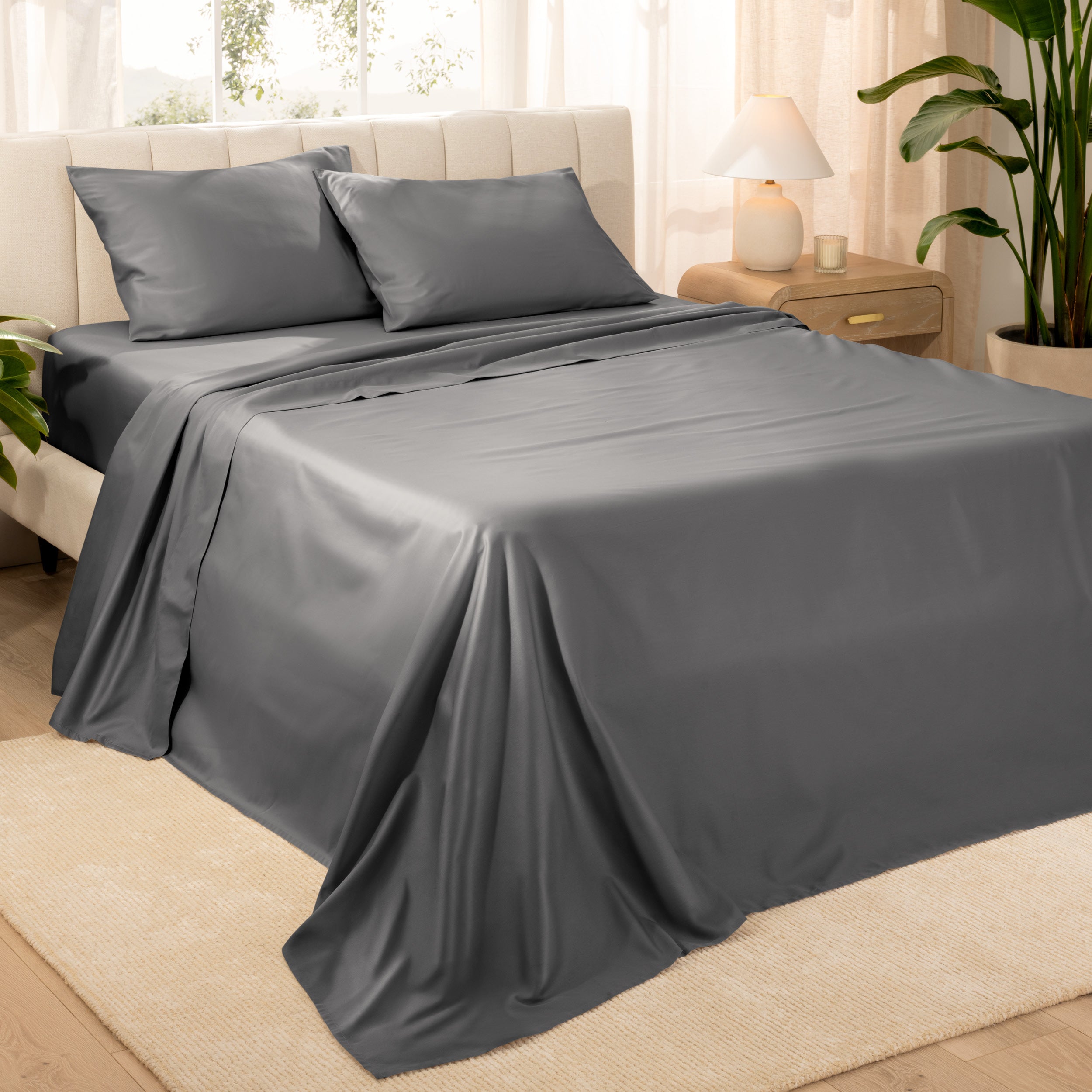 Diagonal view of a decorated room scene with sateen sheets