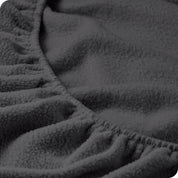 A close view of a polar fleece fitted pocket showing the texture.