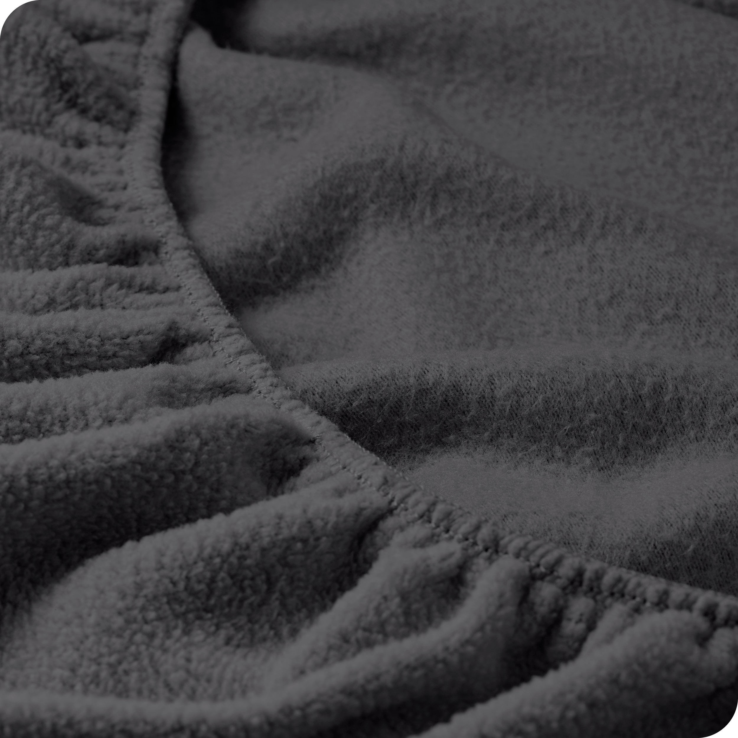 A close view of a polar fleece fitted pocket showing the texture.