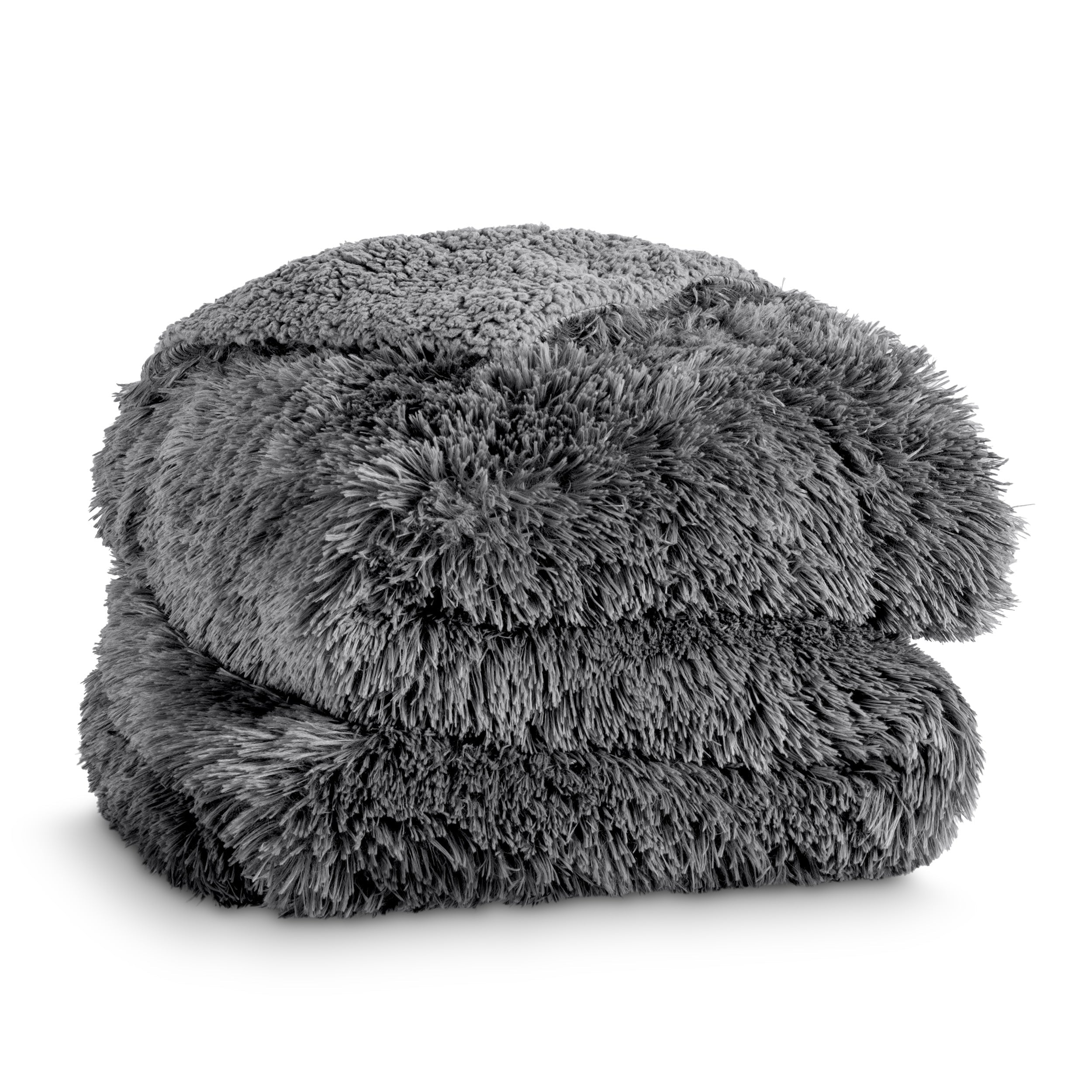 A shaggy faux fur blanket folded